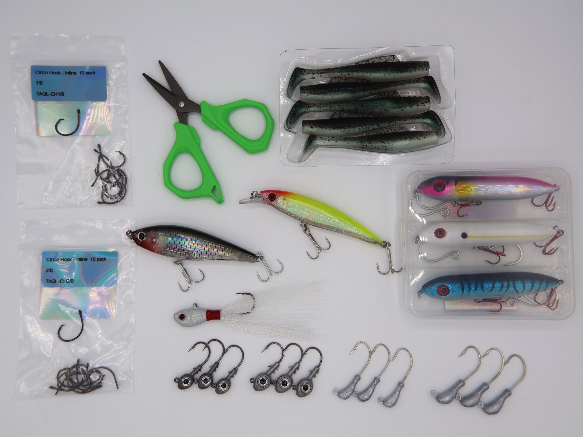 TAQL Box Inshore Fishing Bundle with saltwater fishing lures, jig heads, hooks, braid cutters and terminal tackle